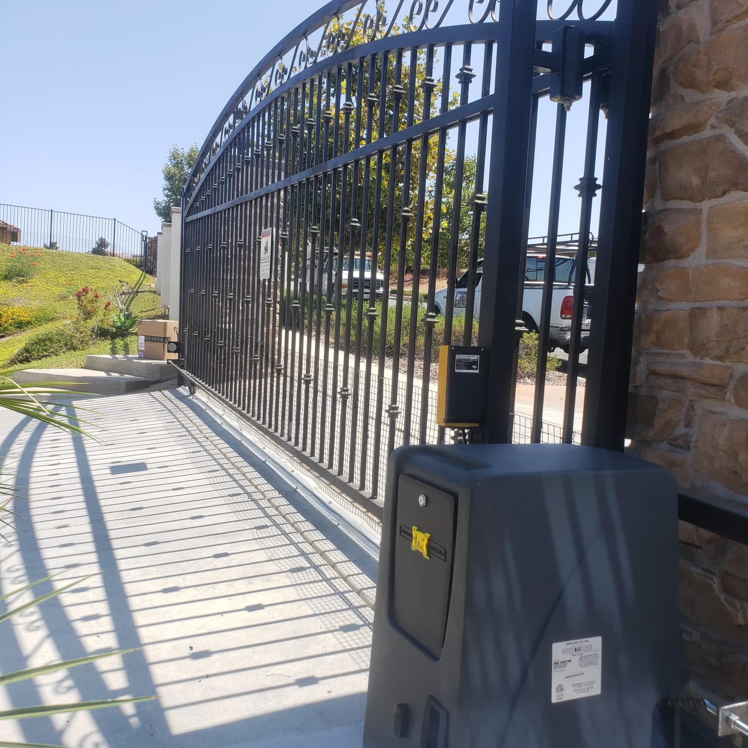 Arched Iron Driveway Gate